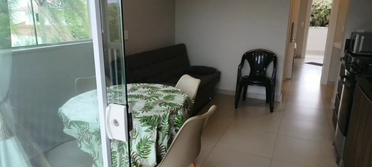 Sala de estar com acesso à varanda