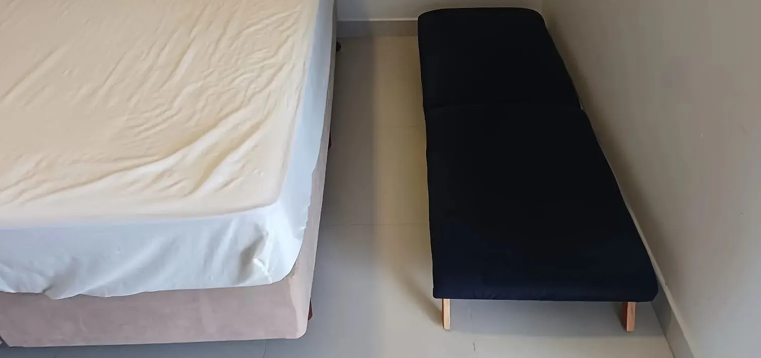 Cama auxiliar no quarto